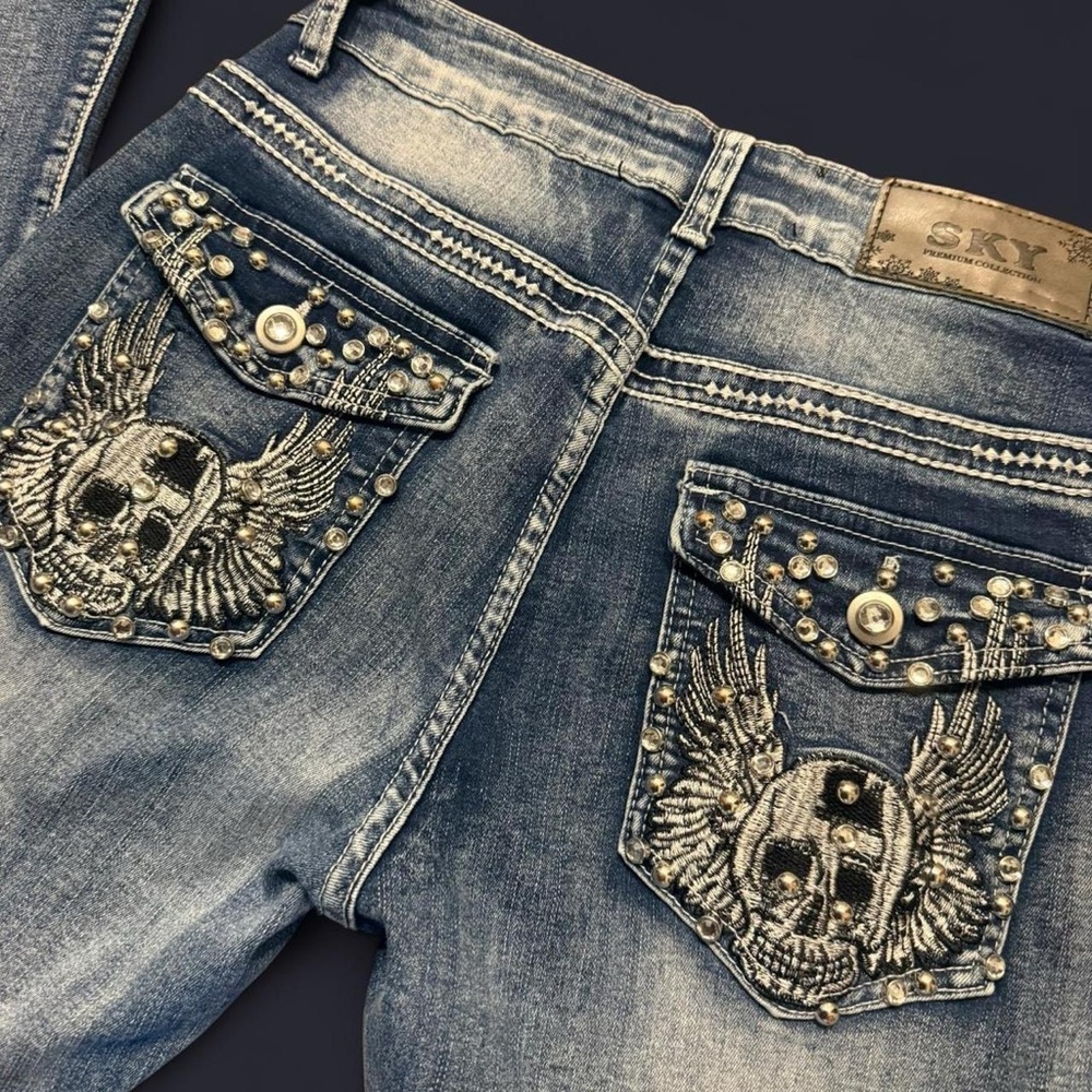 Sky Studded Winged Skull Jeans in Denim Blue
